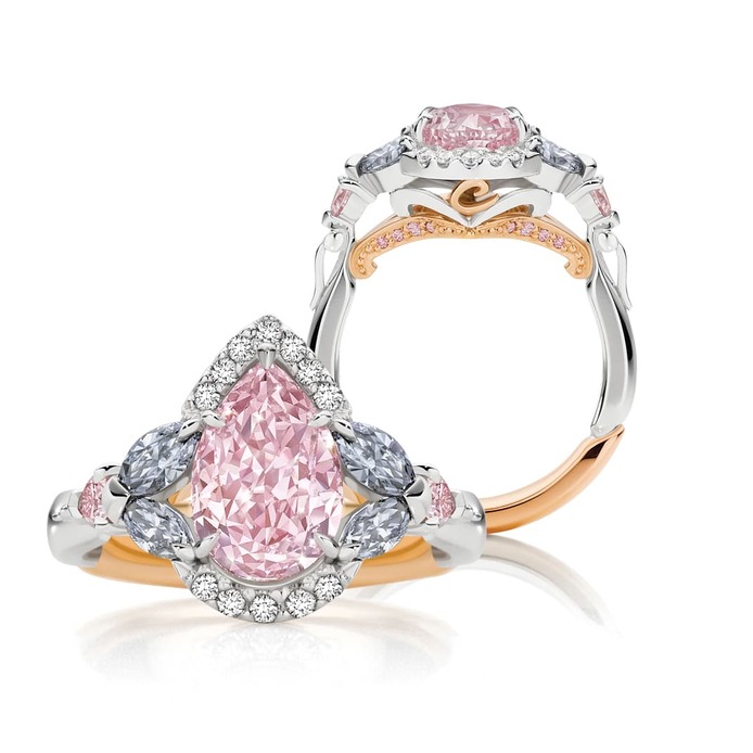 'Tsarina' ring with 2.15ct pear cut fancy intense purplish pink diamond, four marquise cut blue diamonds from the 2012 Argyle Tender, and colourless diamonds, in platinum and 18k rose gold