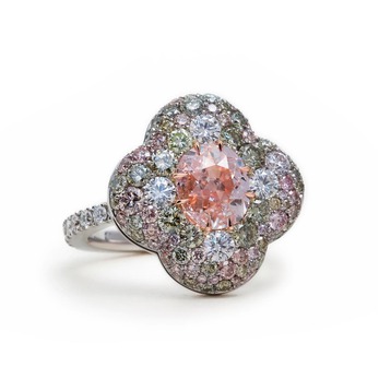 Ring with old mine cut pink diamond, green and pink diamond pavé and 18k white gold