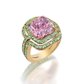 'Infinitas' ring for Sotheby's Diamonds with a 6.78ct fancy intense pink diamond and pavé-set light green grossular garnet in 18k yellow gold
