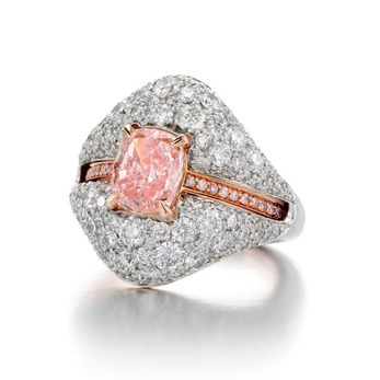 Ring with central 1.50ct cushion cut natural pink diamond in 18k rose gold, and a party jacket with 2.62ct of brilliant cut diamonds in 18k white gold and 18k rose gold