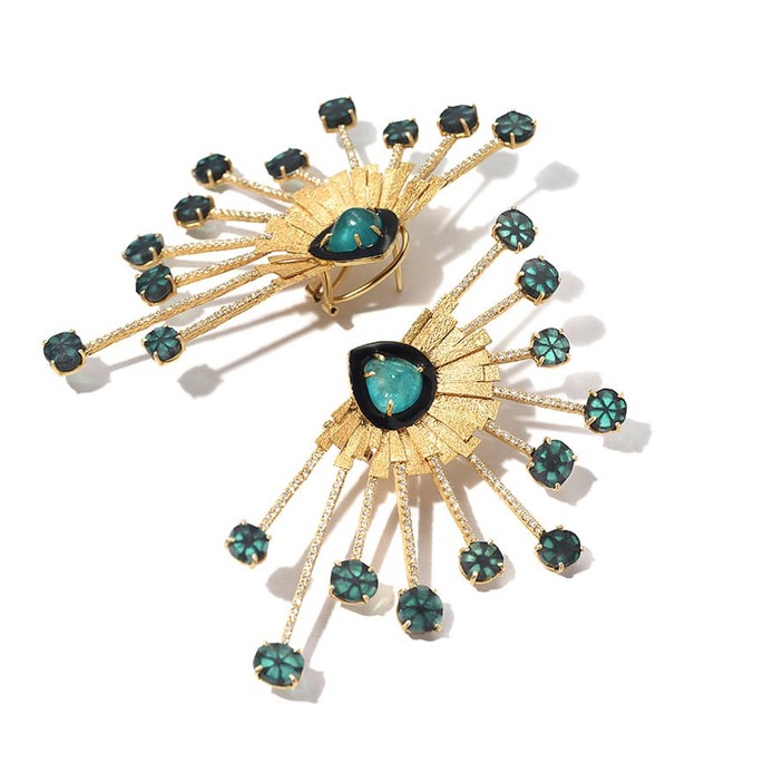 ‘Bloom’ earrings from the ‘Coomi X Muzo’ collection with 13.20ct Muzo Colombian trapiche emeralds, 3.30ct cabochon emeralds, 1.05ct diamonds and black enamel in 20k yellow gold