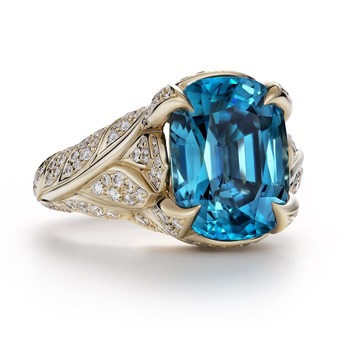 Ring with blue zircon and diamonds in 18k yellow gold
