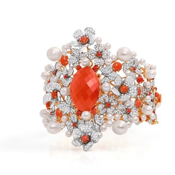 Bracelet in coral, carnelian, pearl, and diamond in 18k yellow gold